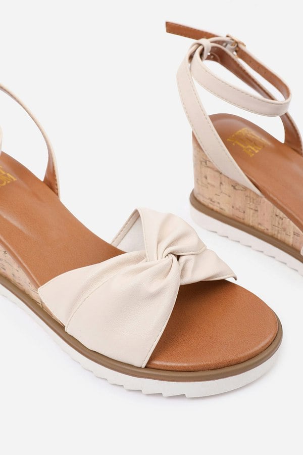 Where's That From Katara Wide Fit Knot Detail Wedge Shoes With Buckle Ankle Strap in Cream Pu