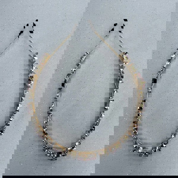 Pink crystal hair band, gold tone frame, faceted light pink gemstones, round and square cut crystals, clear accent stones, elegant slim headband, sparkling statement hair accessory
