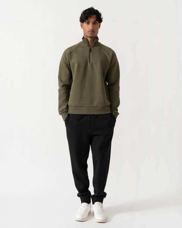 Man wearing BOSS Green Sweat Mens 1/4 Zip Sweatshirt 50565306 - Open Green 398