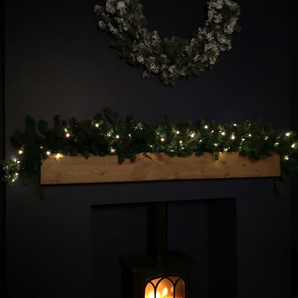 Samuel Alexander 1.8m Plain Green Christmas Garland with 164 Tips and 50 Warm White LED Lights