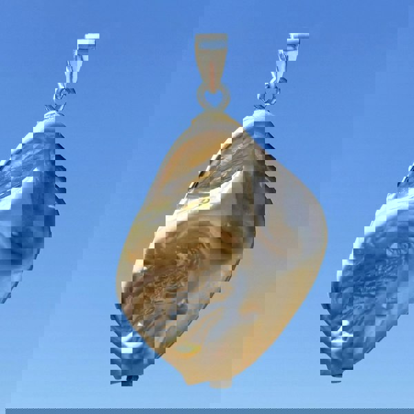 Gold shell summer pendant charm by LENAE.