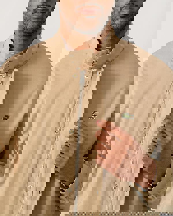 zip detail shot of a Lacoste Lightweight Water-Repellent Twill Mens Harrington Jacket in Viennese 02S