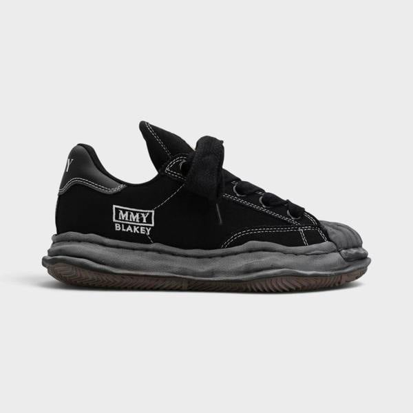 Supplied Fashion Maison Mihara Yasuhiro Blakey Puffer black canvas low-top sneaker with signature distressed OG sole.