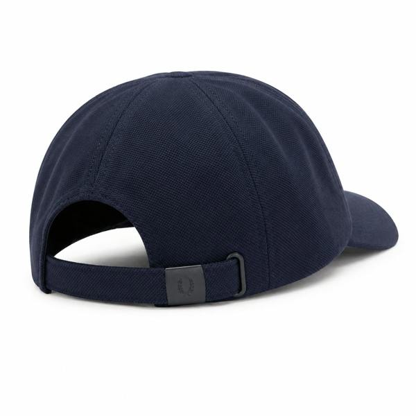 Fred Perry Piqué Classic Cap in navy, featuring an adjustable strap and black laurel wreath buckle.