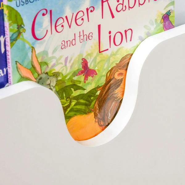 White cushioned lid edge with arched cutout, showing open book slot for children