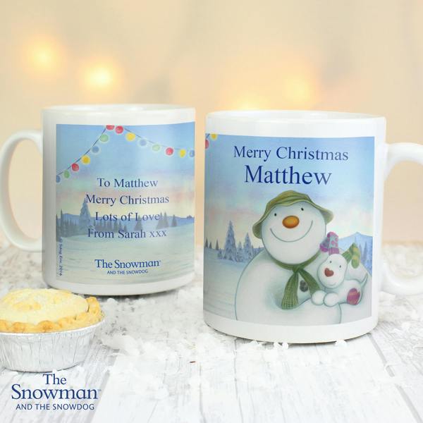 Front and back view of the Personalised Traditional The Snowman and the Snowdog Mug showing the front design for Matthew alongside the custom printed reverse message page