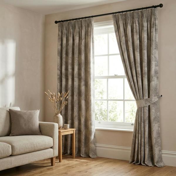 Feather made-to-measure curtains in Dove, styled in a living room