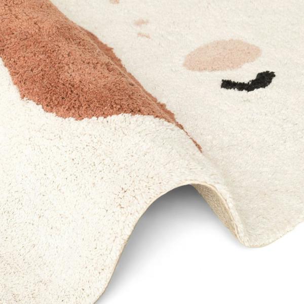 Close-up of a children's rug with a cartoon character design on a white background