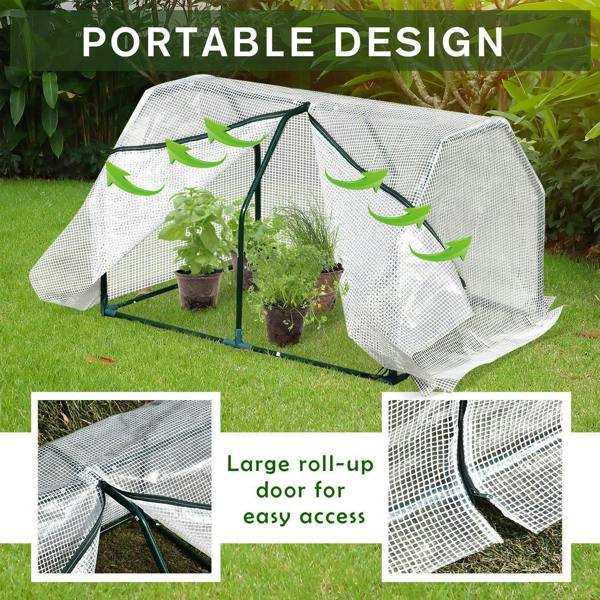 Mini greenhouse with white mesh cover, green steel frame, roll-up door over plants