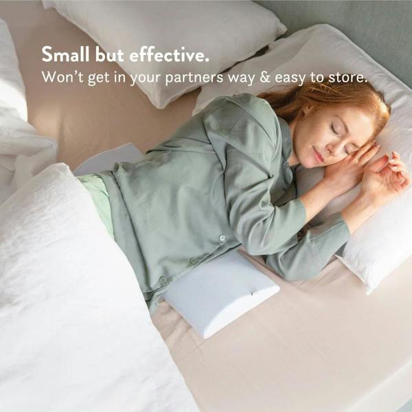 Bed Back Support Pillow - Putnams Place this D shaped firm pillow under the small of your back to support the natural S shape of the spine during sleep. Gives pressure relief to the back when in pain.