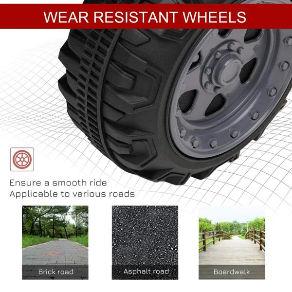 Close-up of large black all-terrain wheels on a red kids electric quad bike