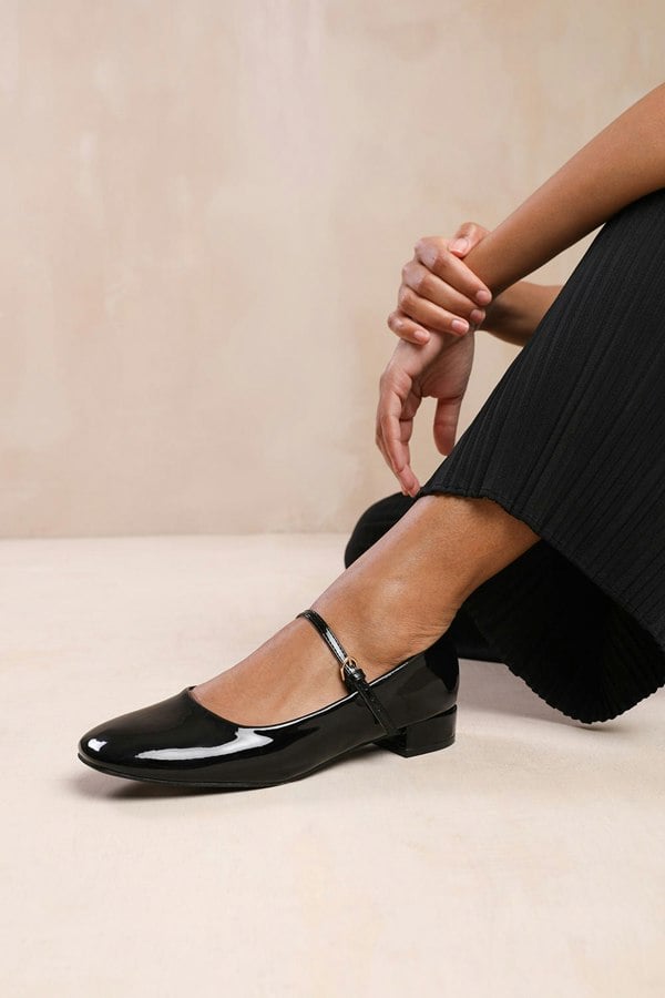 Where's That From Minsk Low Heel With Strap and Buckle Detail in Black Patent