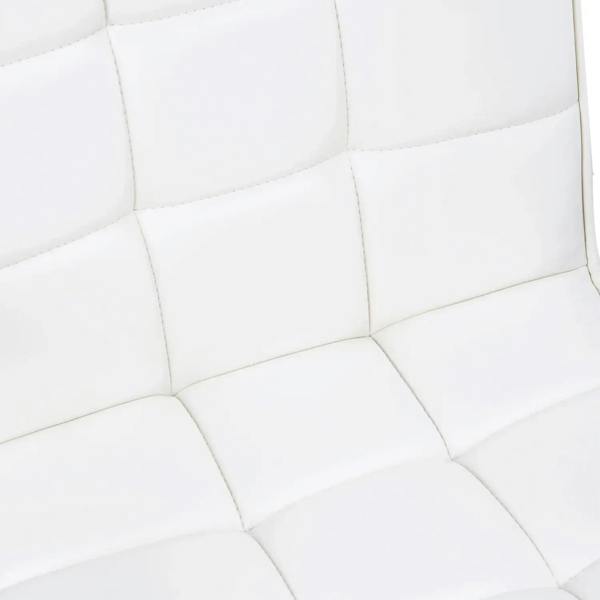 Close-up of white padded seat and back panels with stitched, quilted sections