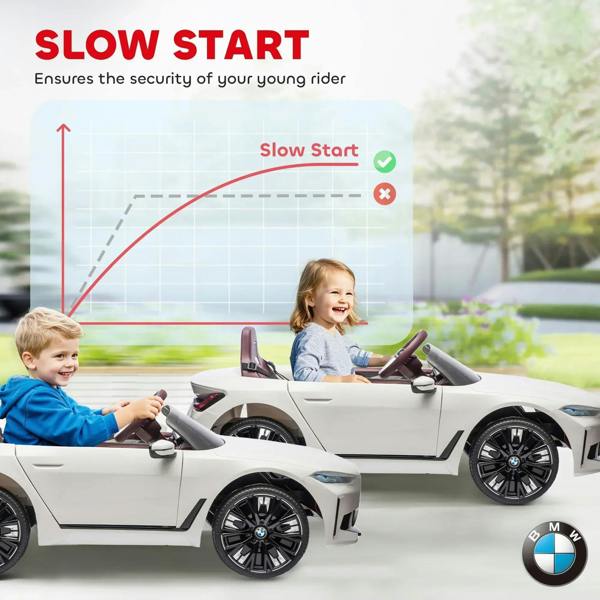 White kids electric ride-on car, two children riding, maroon steering wheel and seat.