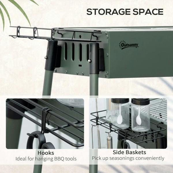 Green portable charcoal BBQ grill with side hooks and seasoning storage baskets
