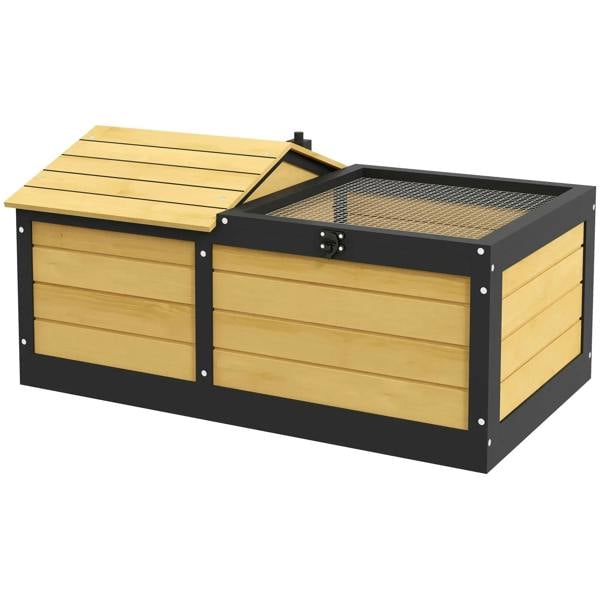 Small yellow wooden reptile shelter with black frame, open top, and wire-mesh run
