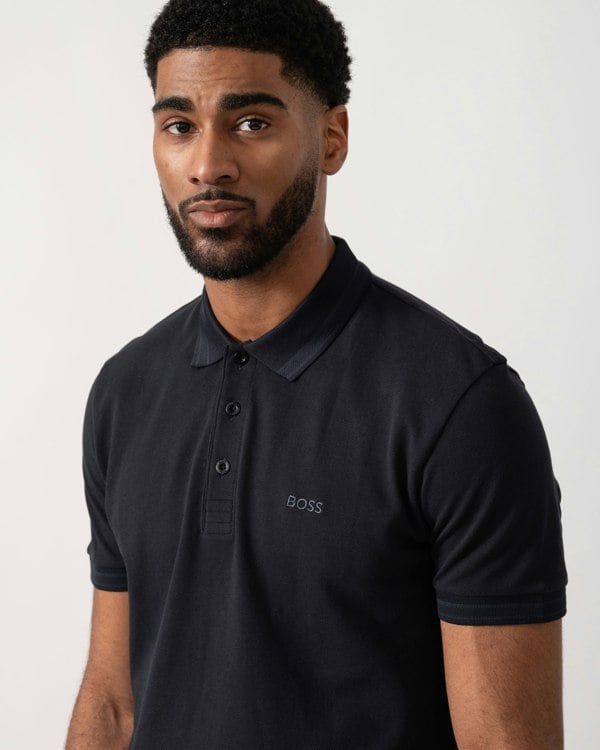 Model wearing BOSS Green Mens Paddy Cotton-Piqué Polo Shirt with Contrast Logo in Dark Blue 408 - Detail
