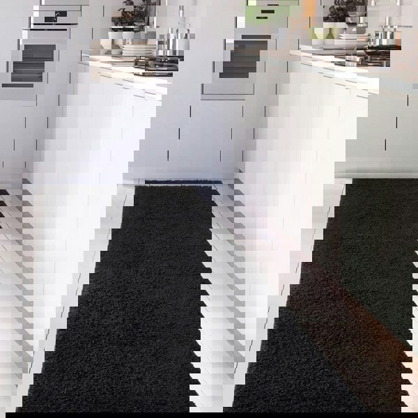 Black shaggy Rug Plain design thick pile, high quality, soft & durable.