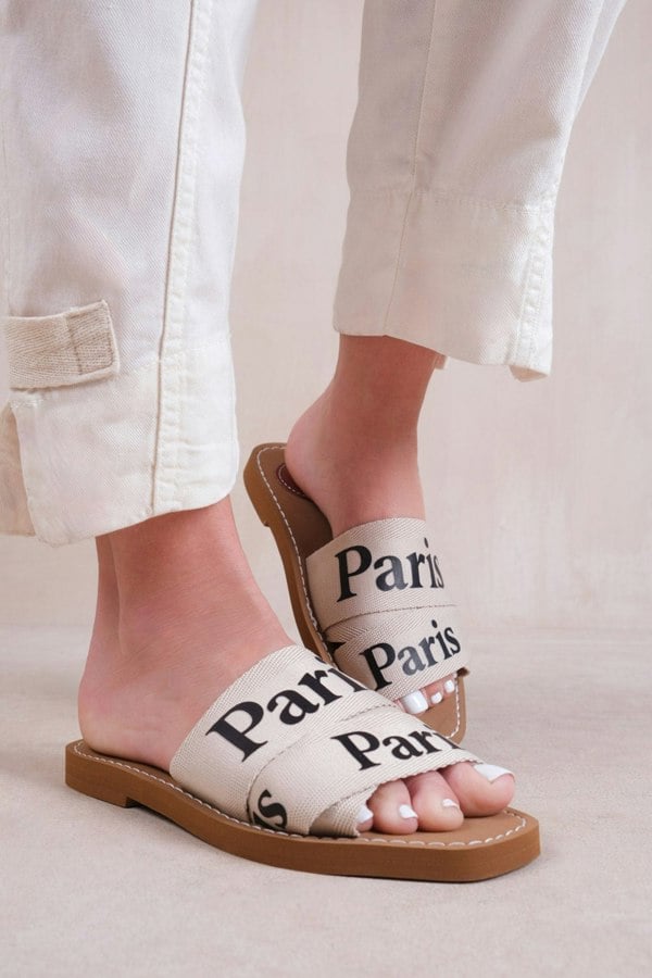 Where's That From Bella Flat Sandals With Cross Over Band in Nude Faux Leather