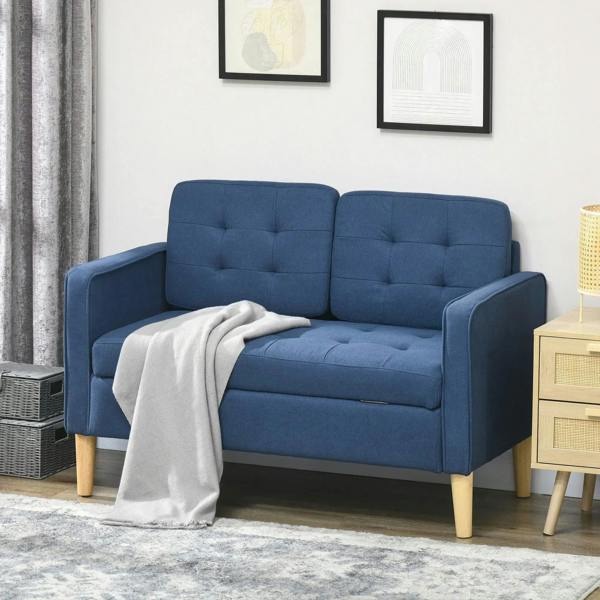 Blue tufted compact loveseat sofa with armrests and wooden legs