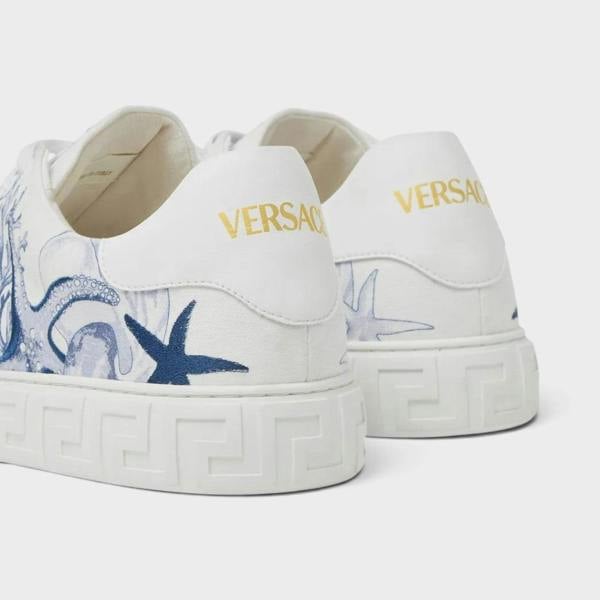 Supplied Fashion Versace Coral Theatre Greca sneakers in white with blue octopus and starfish print and gold logo