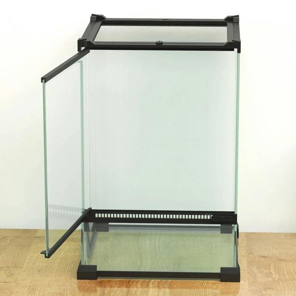 Empty black-framed clear glass reptile vivarium with mesh top and open front access