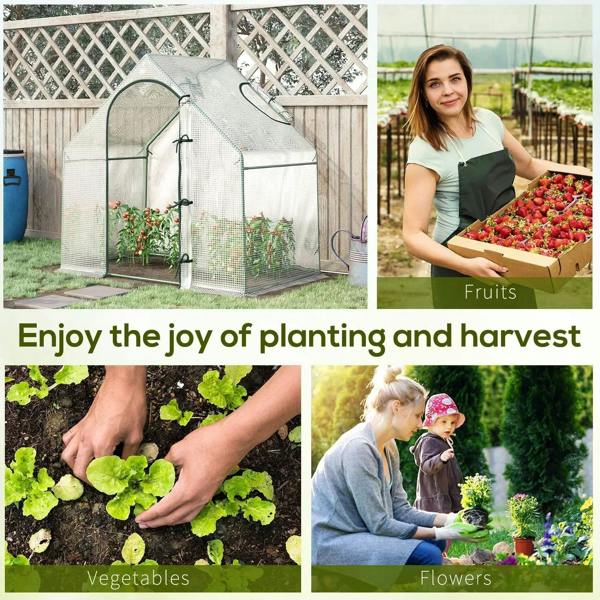 Outdoor white mini greenhouse with zipped door, used to grow plants and flowers