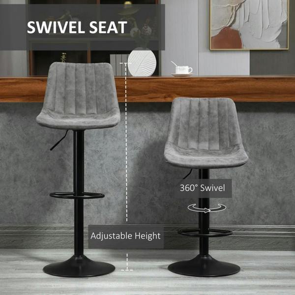 Grey swivel bar stool with adjustable height, quilted back, and black metal base