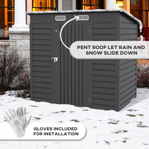Grey metal garden shed with pent roof and side door for rain and snow runoff