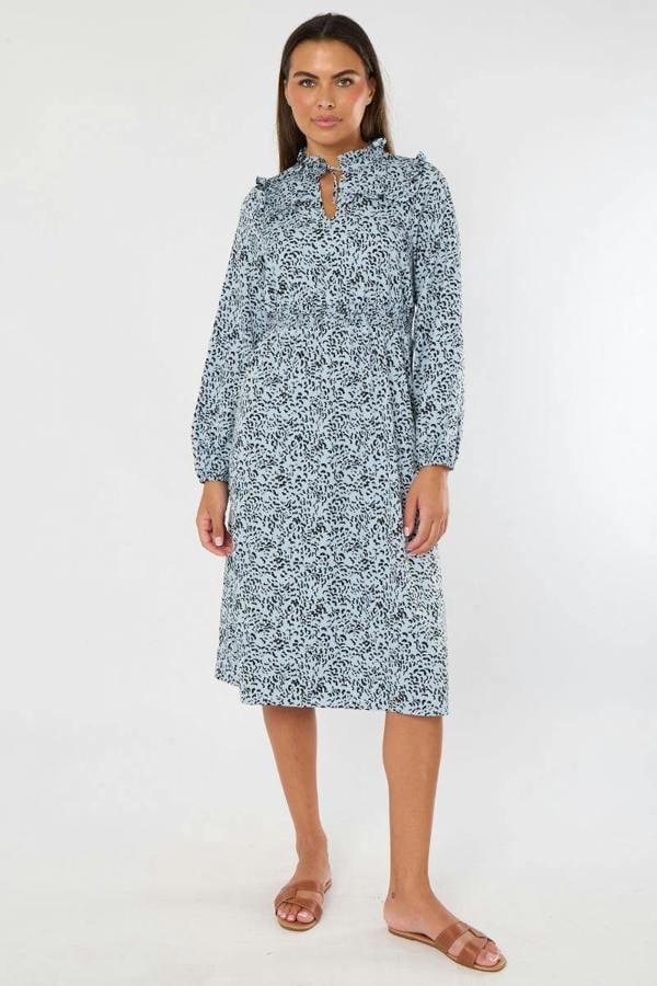 Woman wearing a floral dress on a white background