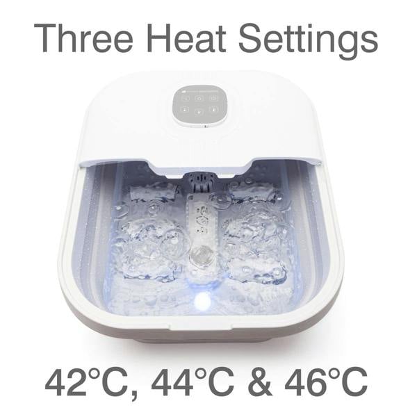 The Rio Deluxe Foldaway Foot Spa Bath, shown in white with bubbling water and a digital control panel, offers three heat settings: 42°C, 44°C & 46°C.