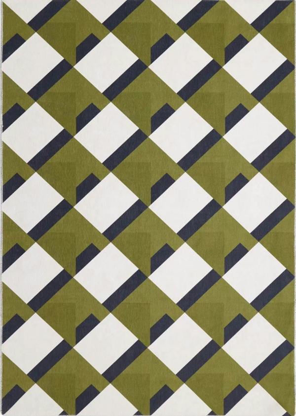 Geometric patterned rug with green, white, and black squares