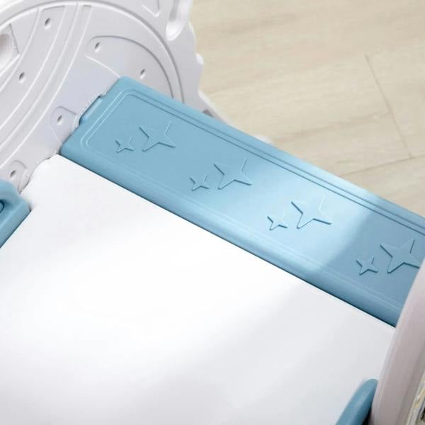 Close-up of blue slide ramp with embossed star grip pattern on white sides