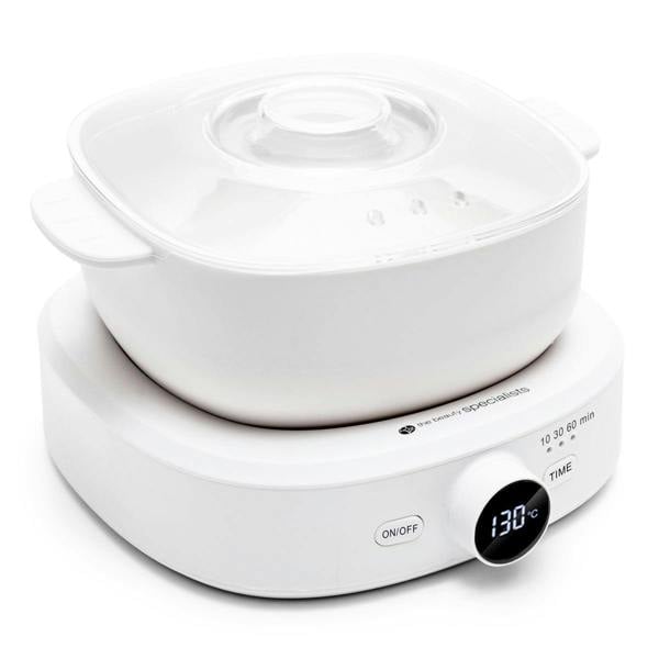 The Rio Go Smooth Hair Removal Wax Heater is a modern white unit with a digital temperature display (up to 130°C), time dial, on/off button, and clear glass lid—ideal for melting wax for professional hair removal.