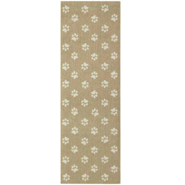 Beige rug with white paw print pattern on a plain background