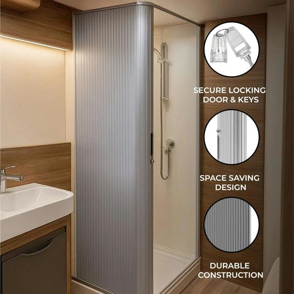 Silver Tambour shower door featuring a secure locking mechanism, space-saving design, and durable construction in a modern bathroom setting