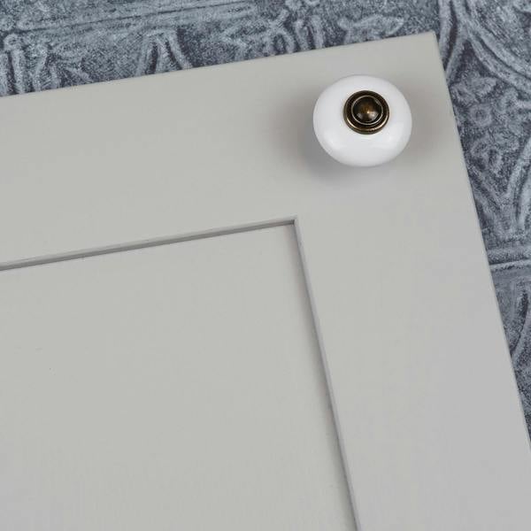 White ceramic round mushroom knob with antique centre