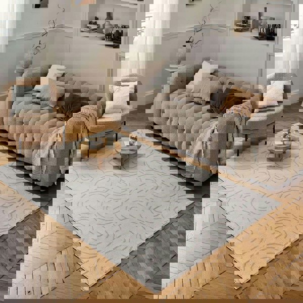 Living Room rug, beige-cream colours, geometric, practicality in mind, the rug is anti-allergic.