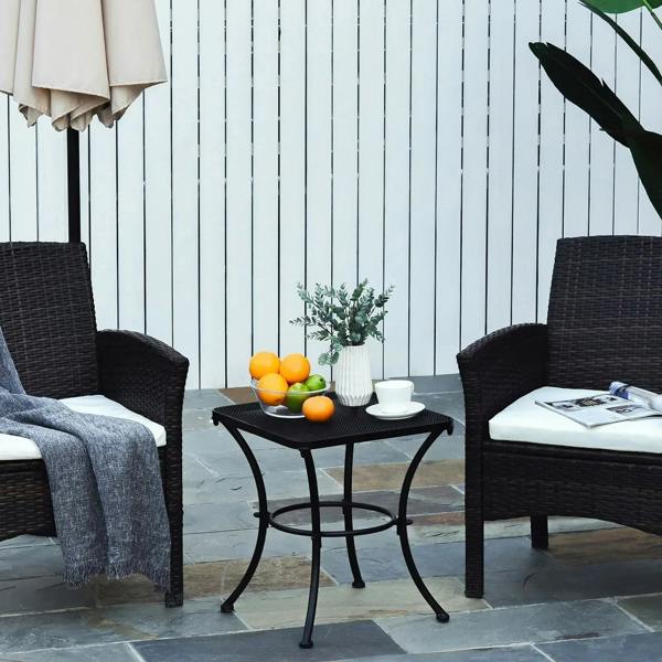 Black metal square bistro table with mesh top and curved legs