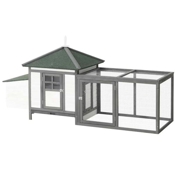 Grey wooden chicken coop with nesting box and enclosed outdoor run, dark green roof panels.