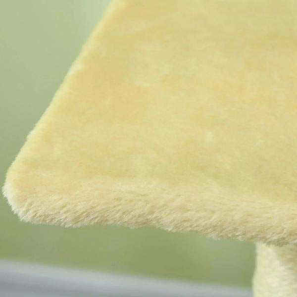Cream plush top platform cushion on a cat tree
