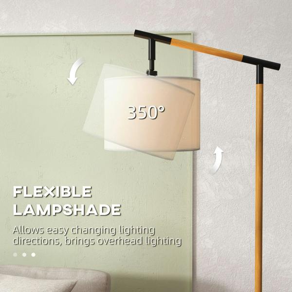 Brown floor lamp with cream drum shade and rotating shade head