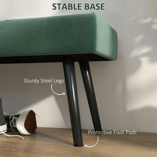 Green upholstered bench with sturdy steel legs and protective foot pads
