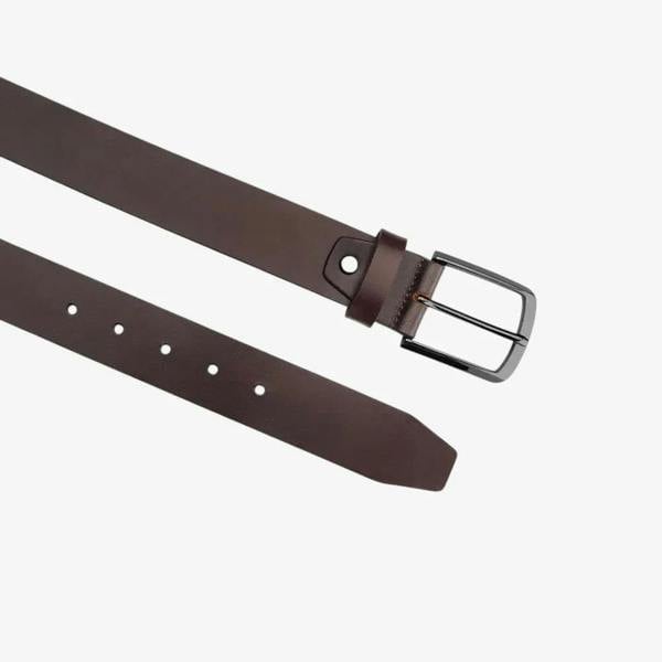 Top angle view of Brown leather belt with a black buckle on a white background