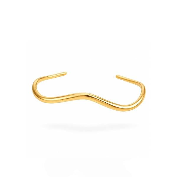 Gold nose ring on a white background