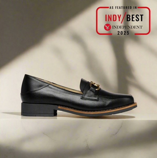 Black leather loafer shoe on a light background with 'Indy Best Independent 2025' badge.