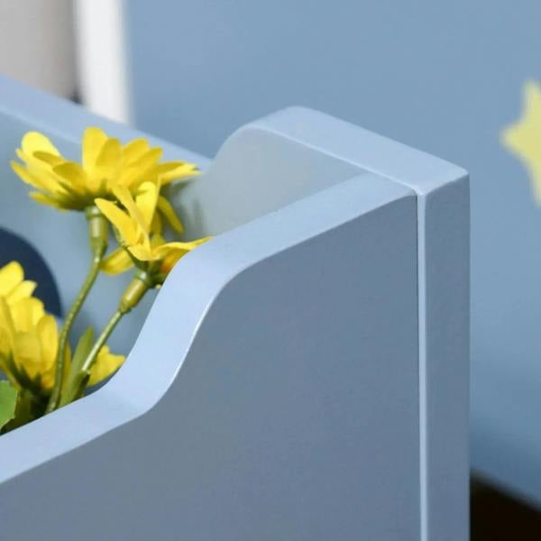 Kids wooden toy box blue lid corner with rounded edge close-up