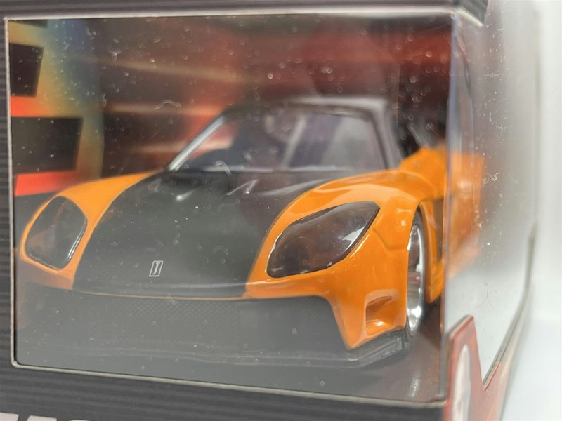 a toy car in a box