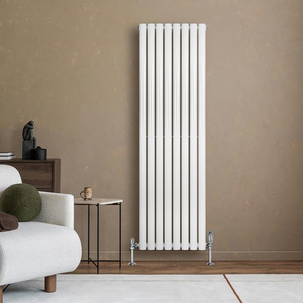 Sleek white oval single column radiator, 1600 x 480mm, mounted on a textured wall, complementing modern living room decor