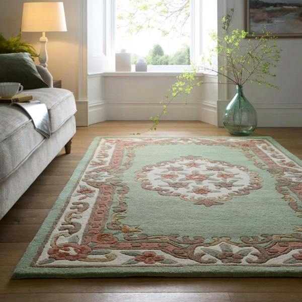 Decorative rug with intricate patterns in a living room setting.